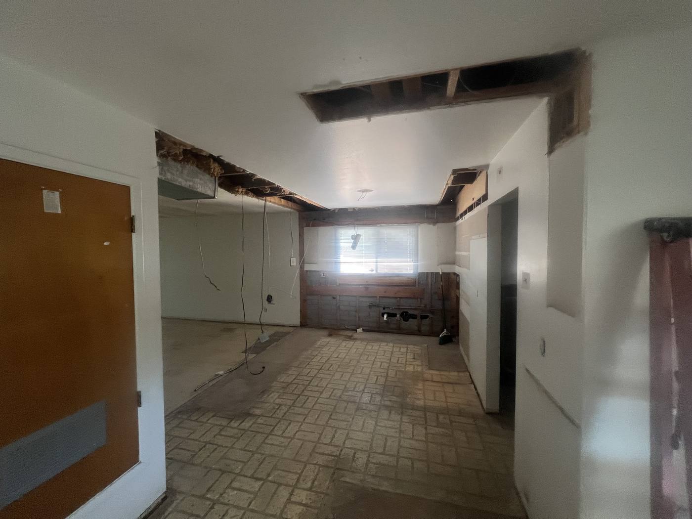 Kitchen gutted, soffits opened