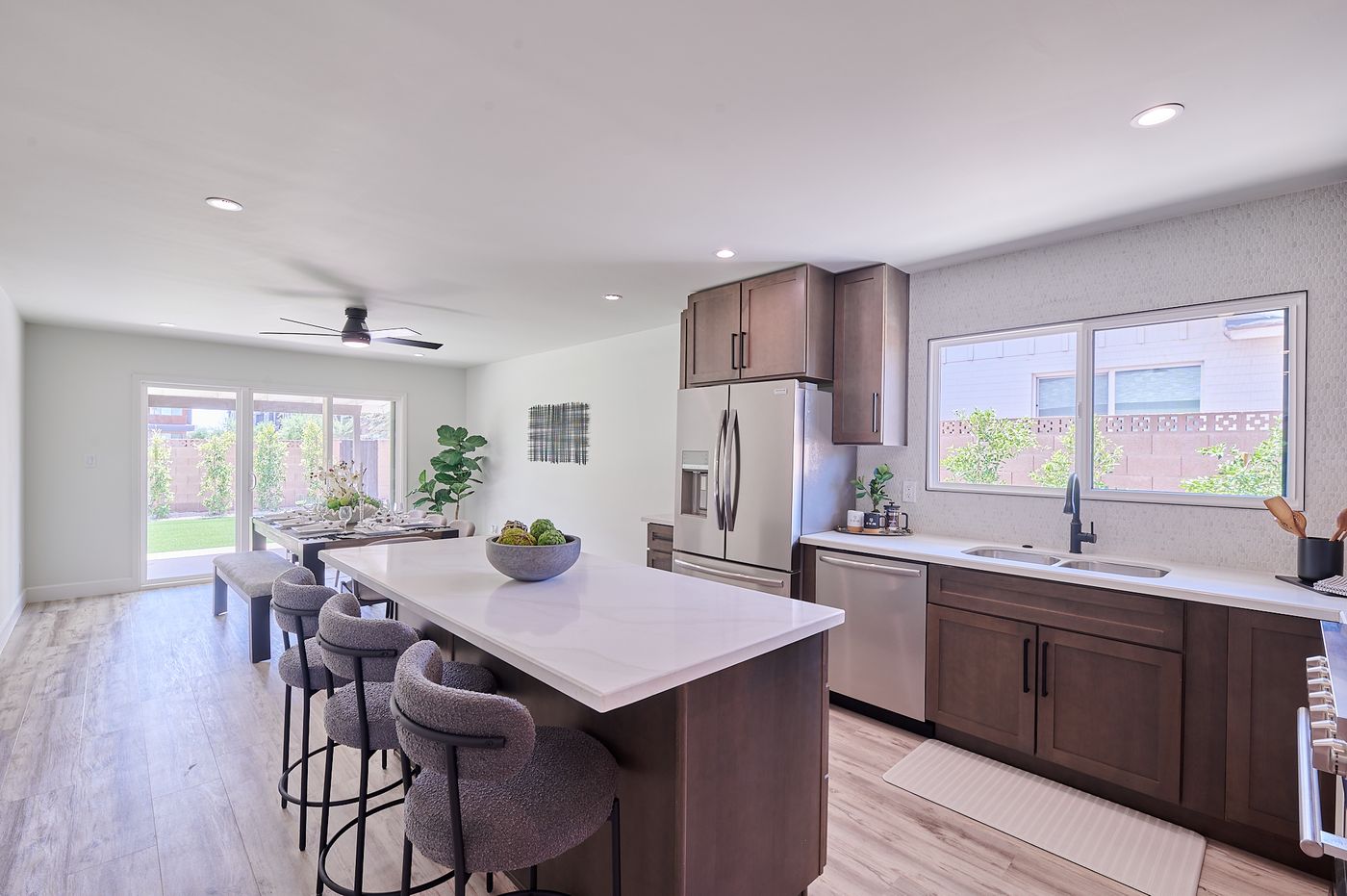 New kitchen with quartz island and custom cabinetry